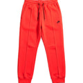 Nike Sportswear Tech Fleece Joggers for women in orange, XS size, showing the comfortable fleece fabric and athletic fit.