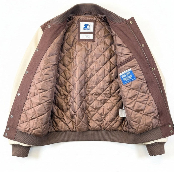 Men's NFL Cleveland Browns varsity jacket with quilted lining, large size, featuring team logo and classic varsity style.