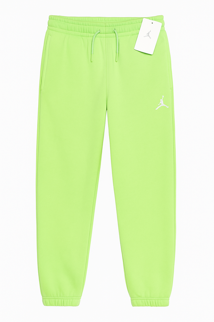 Jordan Ghost Green sweatpants for kids, size 12–13, with elastic waistband and Jordan logo detail visible.
