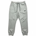 Women's Nike Tech Fleece Joggers in size 2X, showing the comfortable black joggers with Nike logo on the leg.