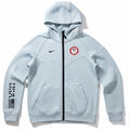 Nike Tech Fleece Windrunner Hoodie in gray with Team USA Paralympic 2024 branding, featuring a hood and Nike logo.