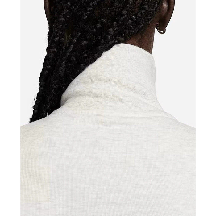 Nike Tech Fleece Windrunner jumpsuit in grey, featuring a hood and full-length zipper, displayed on a hanger.