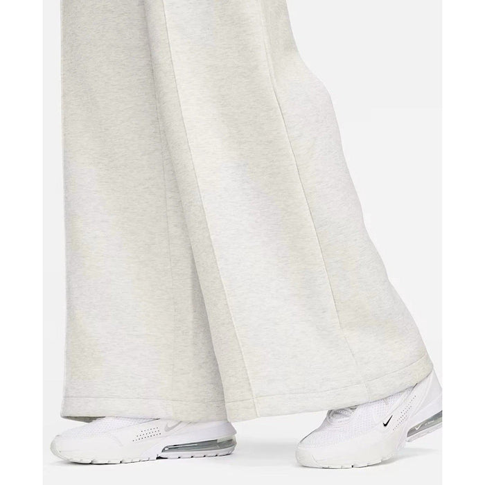 Nike Tech Fleece Windrunner jumpsuit in grey, showing the full-length design with Nike branding and fleece fabric details.