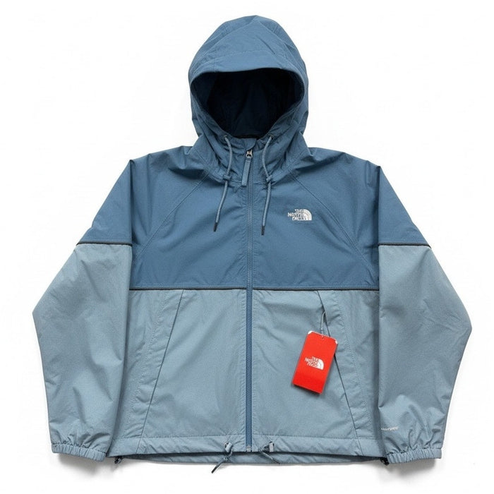 Women's The North Face Antora Jacket in Indigo Stone Novelty, shown in a stylish outdoor setting.