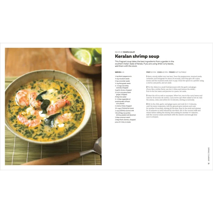 Open soup cookbook with recipe text and a bowl of shrimp soup
