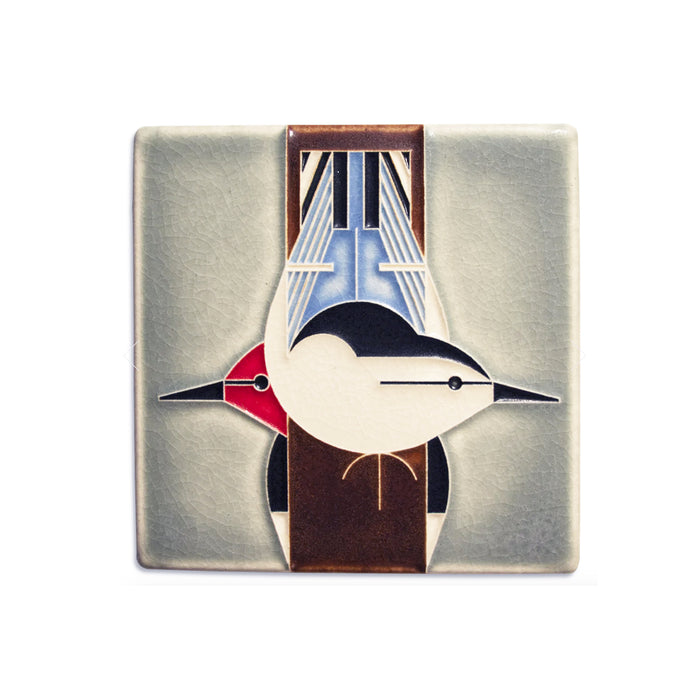 "Upside Downside" art tile is features the design of the Charlie Harper lithograph of the same name. Each art tile is handmade by Motawi in Ann Arbor, Michigan.