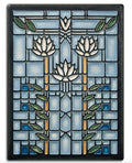 A handmade ceramic tile with a stylized waterlily design in blue and green colors, inspired by Frank Lloyd Wright's drawing.