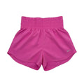 Pink Nike women's high-waisted training shorts made with Dri-FIT fabric, size medium, designed for athletic comfort and style.