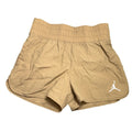 Nike Jordan youth girls' cargo shorts in khaki and legend brown, featuring multiple pockets and a relaxed fit.